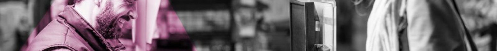 male-retail-worker-serving-middle-aged-lady